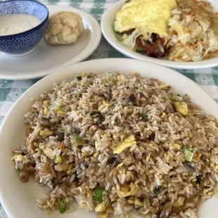 Shrimp Fried Rice and house omelette with a side of biscuits and gravy.