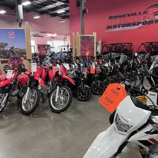 Dirt bikes on the showroom floor.