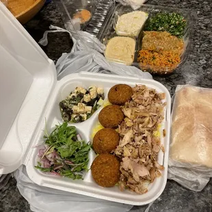 Platter with two proteins and appetizer sampler via delivery.