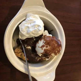 a bowl of ice cream and cookies