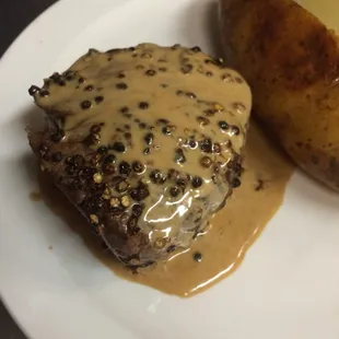 Fillet au poivre. This special peppercorn encrusted fillet topped with a rich gravy served with two sides was outstanding!!
