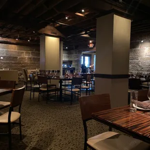 a dining room with tables and chairs