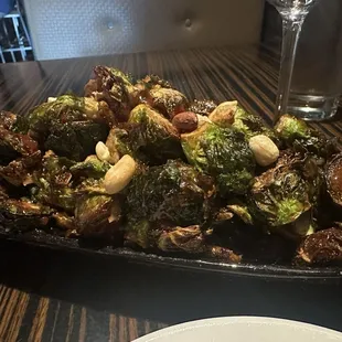 Amazing chile sauced brussels. Perfectly cooked. A happy hour steal for $6!