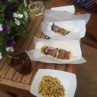 a variety of food items on a wooden table