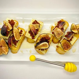 Appetizer: locally grown figs on a crostini with chorizo, manchego cheese &amp; drizzled with honey
