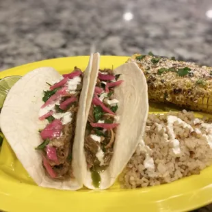 Pork Carnitas with pickled red onions, Rosey's Elote and toasted coconut rice