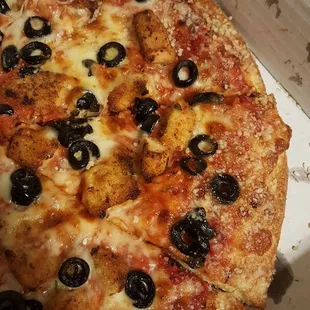 Chicken and black olives with a butter parmesan crust