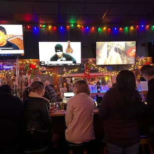 people sitting at a bar