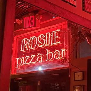 a neon sign for a restaurant
