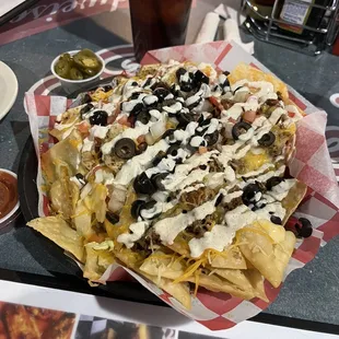 Traditional nachos, with half chicken and half beef (added I think $2 or $3 to the menu price)
