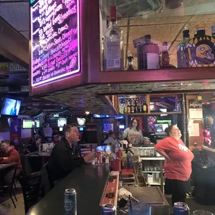 people sitting at the bar