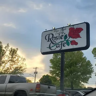 a sign in a parking lot