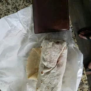 A picture of my wallet size Carne Asada burritos. This place is effing trash.  Never going back!