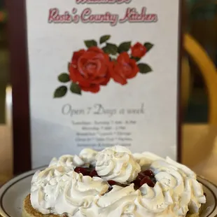 a pie with whipped cream