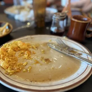 a half eaten plate of food