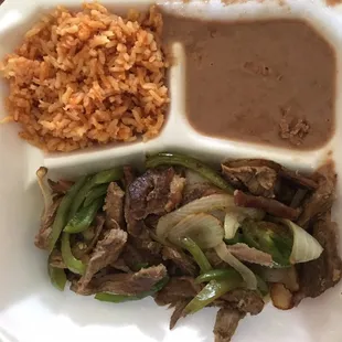 Beef fajitas plate with tortilla