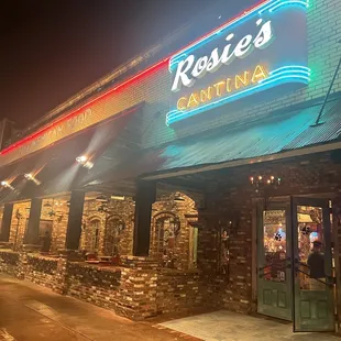 Main entrance with patio dining.
