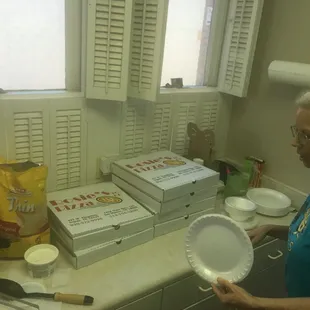 Six pizzas to feed 15 adults was under $43 after tax/before tip.