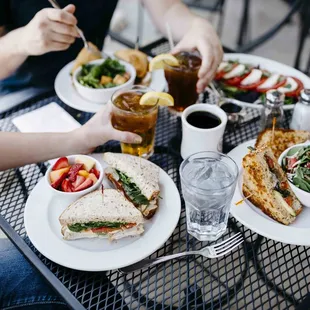 two people eating lunch at a table