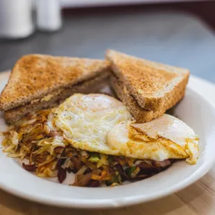a plate of breakfast food on a table