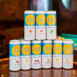 a stack of cans of juice