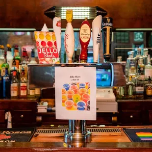 a bar with beer taps