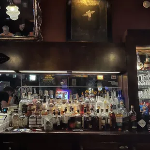 a bar with bottles of liquor