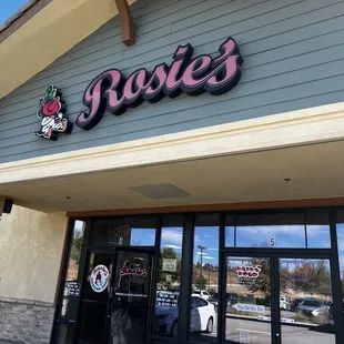 the front entrance of a restaurant