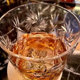 Diplomaticos rum on the rocks - note the 'R' for rosina hand stamped into the ice cube by the bar staff - nice touch