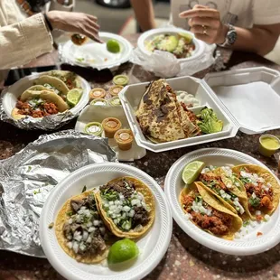 a table full of tacos