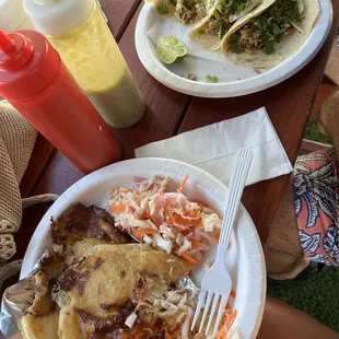 Pupusas and tacos de carnitas with a fresh lemonade.