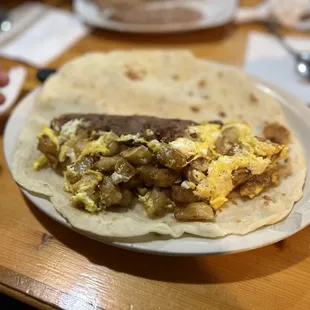 Potato and egg with refried beans.