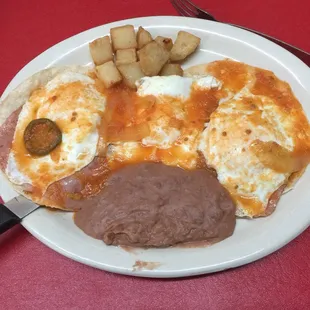 Papis huevos with an extra egg.