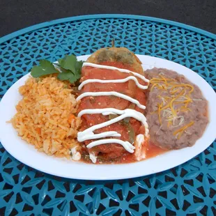 Chile Relleno served with rice,  beans and tortillas