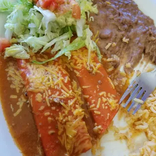 cheesy cheesy enchiladas with guacamole salad and tea. the best deal in Caldwell co period.