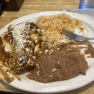Already ate a lil lol but the mole enchiladas in question:)