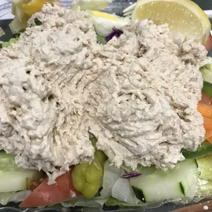 ordered 2 Tuna Salads from Roslindale House of Pizza today There was a hair in both salads they never apologized But got my money back