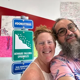 a man and woman taking a selfie