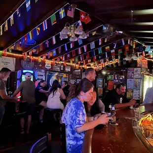 a woman sitting at a bar