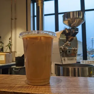a cold beverage in a plastic cup