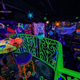 a neon glow room with neon furniture