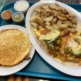 Huevos Ranchero with potatoes and Asada Mulita