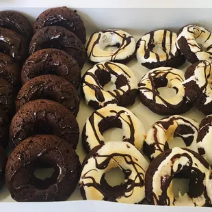 a variety of chocolate donuts