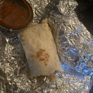 I paid $1.50 for this breakfast burrito Special Mon-Friday (Refired beans, eggs &amp; chorizo)