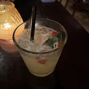 a drink in a glass with a straw