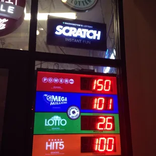 a digital score board in a store window