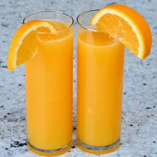 two glasses of orange juice