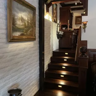 a staircase leading up to the kitchen