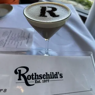 a drink in a martini glass