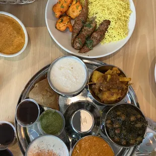 a variety of dishes of food